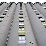 gray concrete building with glass windows