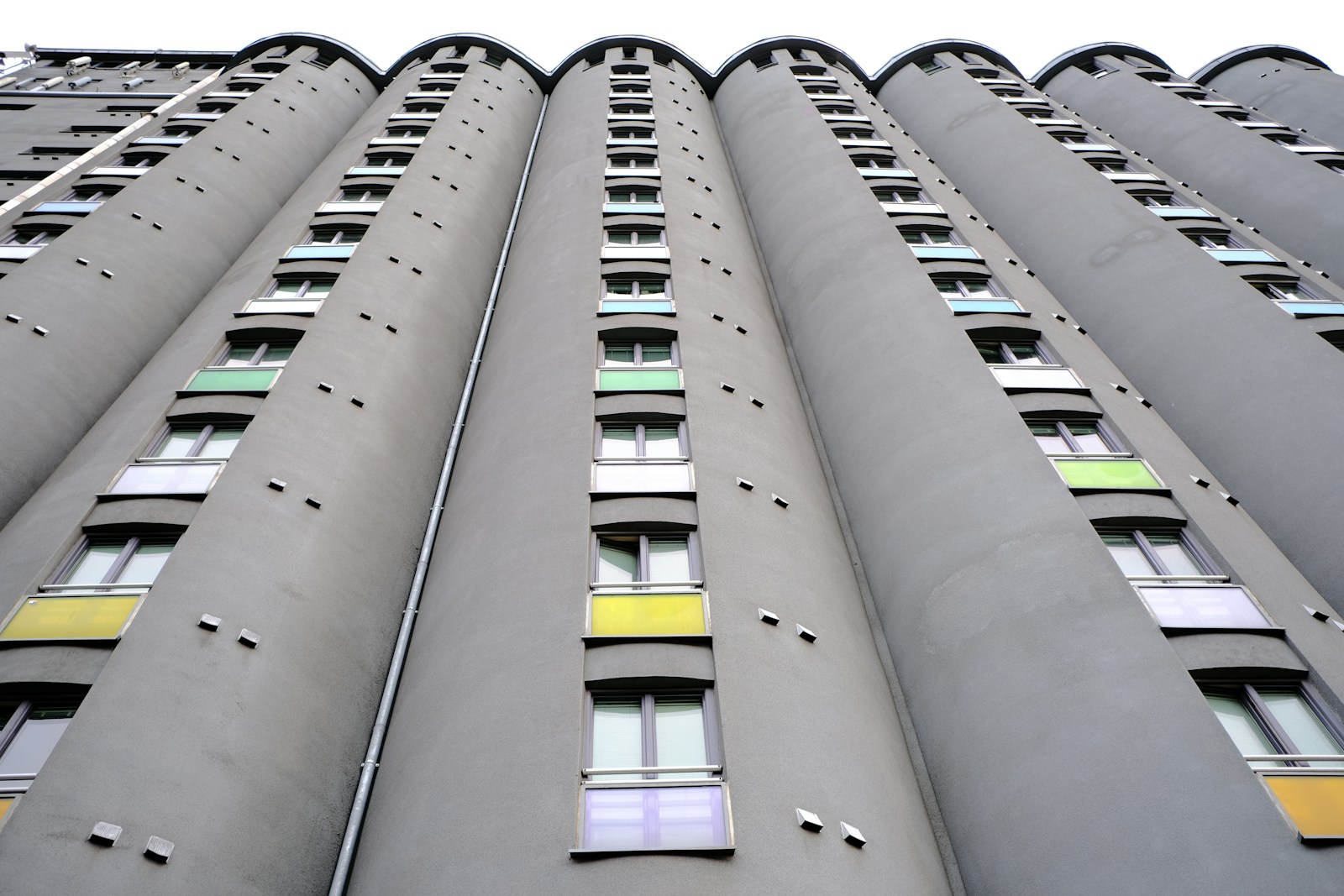 gray concrete building with glass windows