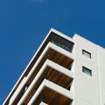 white concrete building with balconies during day