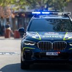 a police car parked on the side of the road