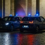 a couple of police cars parked next to each other