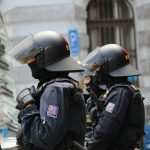 a group of police officers standing next to each other