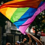 people holding flags during daytime