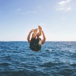 man back tumbling during daytime