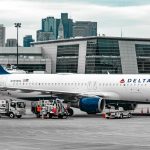 white passenger plane on airport during daytime