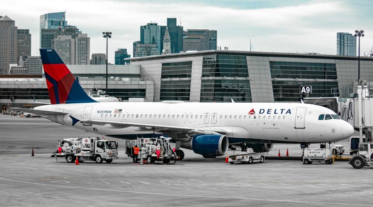 white passenger plane on airport during daytime