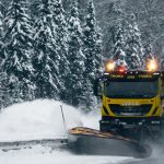 A Truck Clearing the Road of Snow