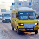 yellow van on road during daytime