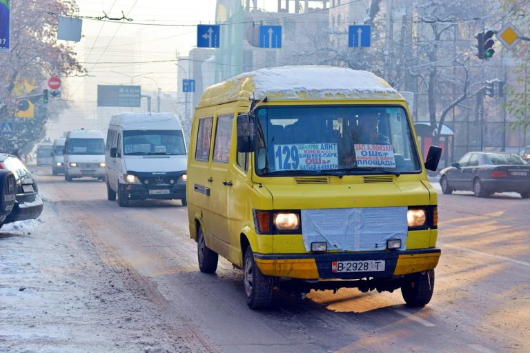 yellow van on road during daytime