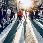 group of people walking on pedestrian lane