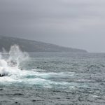 waves crashing against rocks