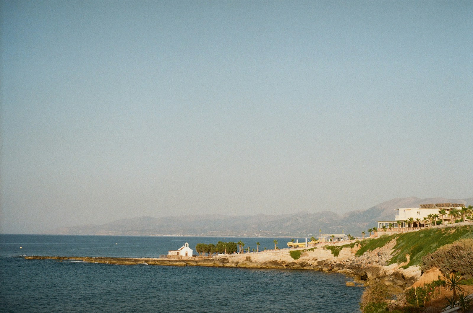 white boat on sea during daytime