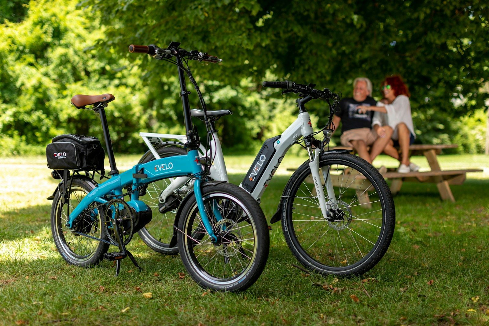 a couple of bikes that are sitting in the grass